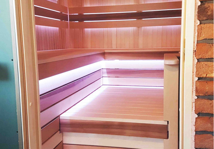 Sauna s pecou na drevo a vonkajším ohniskom