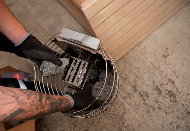 Saunové kamene a ich vrstvenie na jeseň: TOP 3 schémy podľa frakcií a prúdenia vzduchu